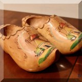 D129. Small pair of decorative wooden shoes.